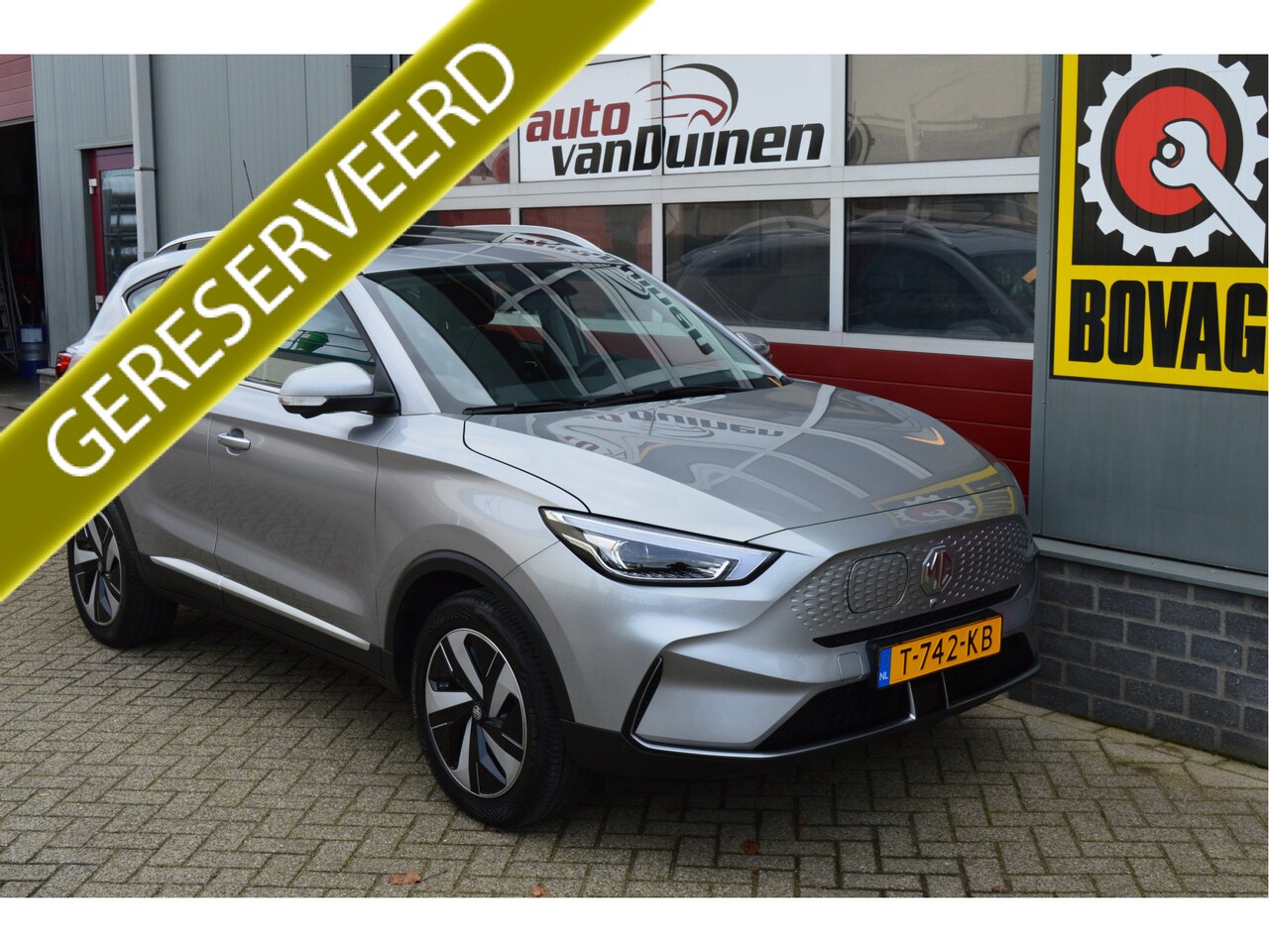 MG ZS - EV Long Range Luxury 70 kWh O.a: SOH 96.4, Afn. Haak, Clima, Pano, PDC, Camera, Cruise, Et - AutoWereld.nl