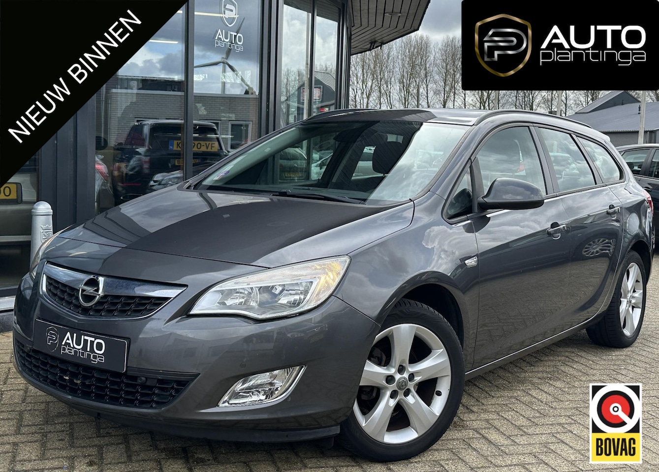 Opel Astra Sports Tourer - 1.4 Turbo Edition 120PK | Afneembare Trekhaak | Navigatie | Cruise Control | Parkeersensor - AutoWereld.nl