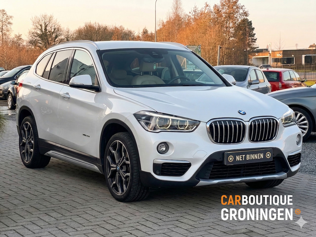 BMW X1 - sDrive20i Sport | AUTOMAAT | ORI NL | HUD | TREKHAAK - AutoWereld.nl