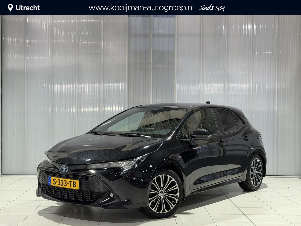 Toyota Corolla - 1.8 Hybrid Dynamic | All season banden | Stuurwielverwarming | Voorruitverwarming | Parkee - AutoWereld.nl
