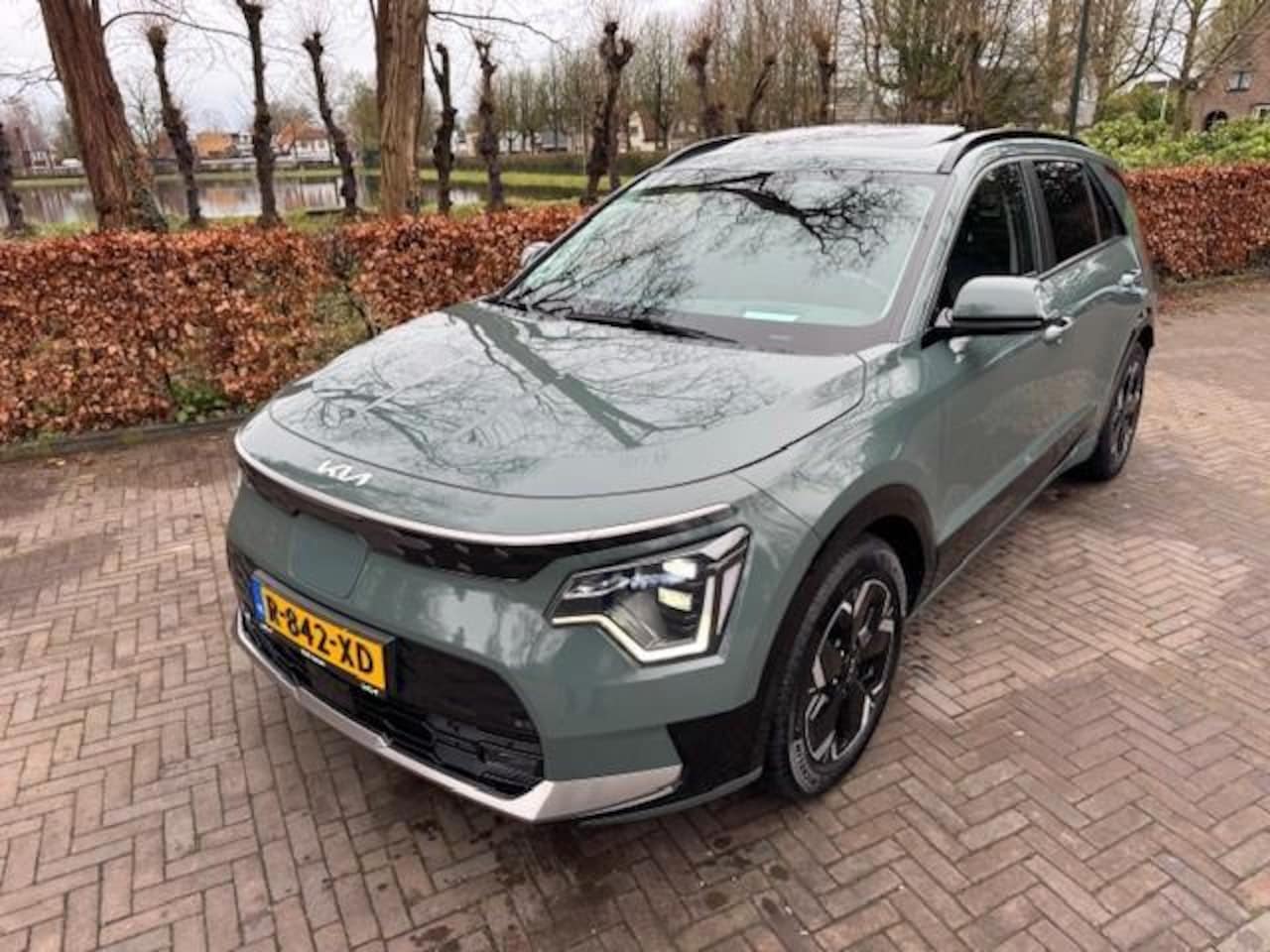 Kia Niro EV - DynamicPlusLine 64.8kWh SOH 100%/Schuifdak/Leer/Nav/Xenon-Led/Fabrieksgarantie - AutoWereld.nl