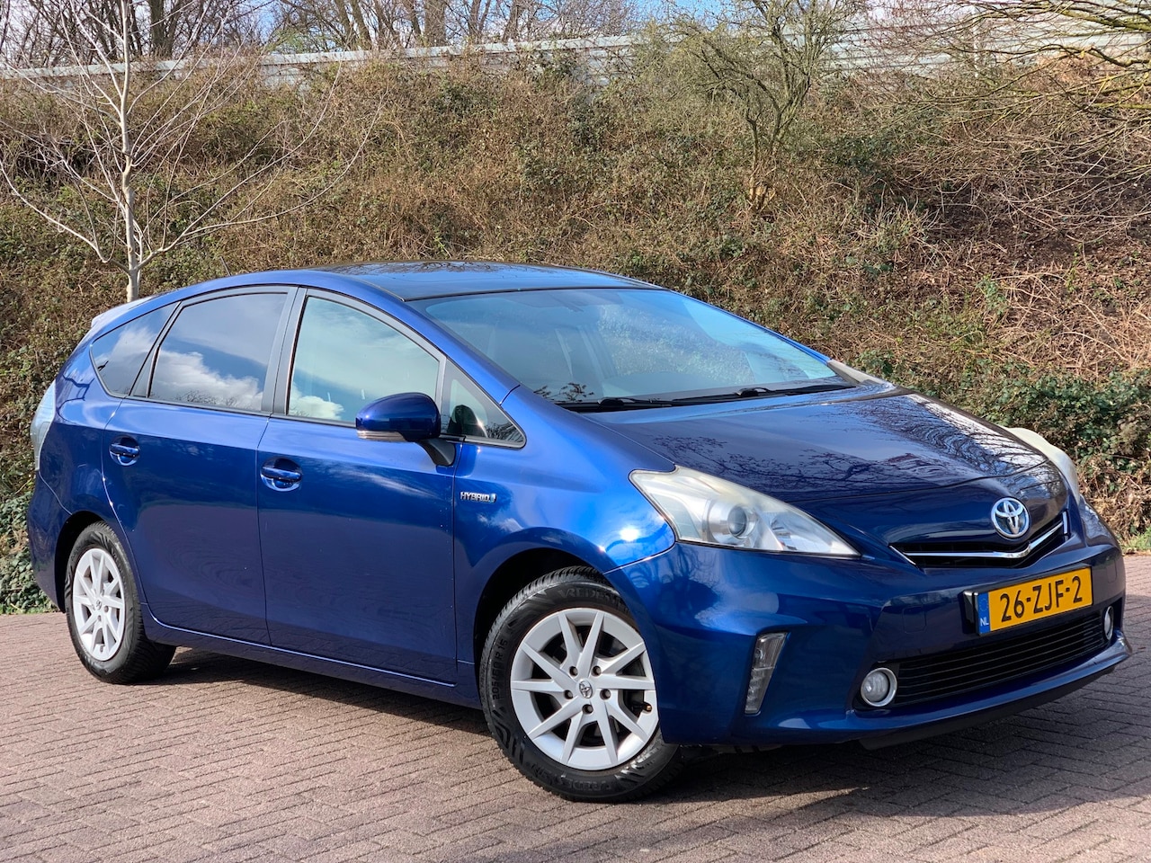 Toyota Prius Wagon - 1.8 Aspiration 96g PANO HUD CLIMA 7 PERS - AutoWereld.nl