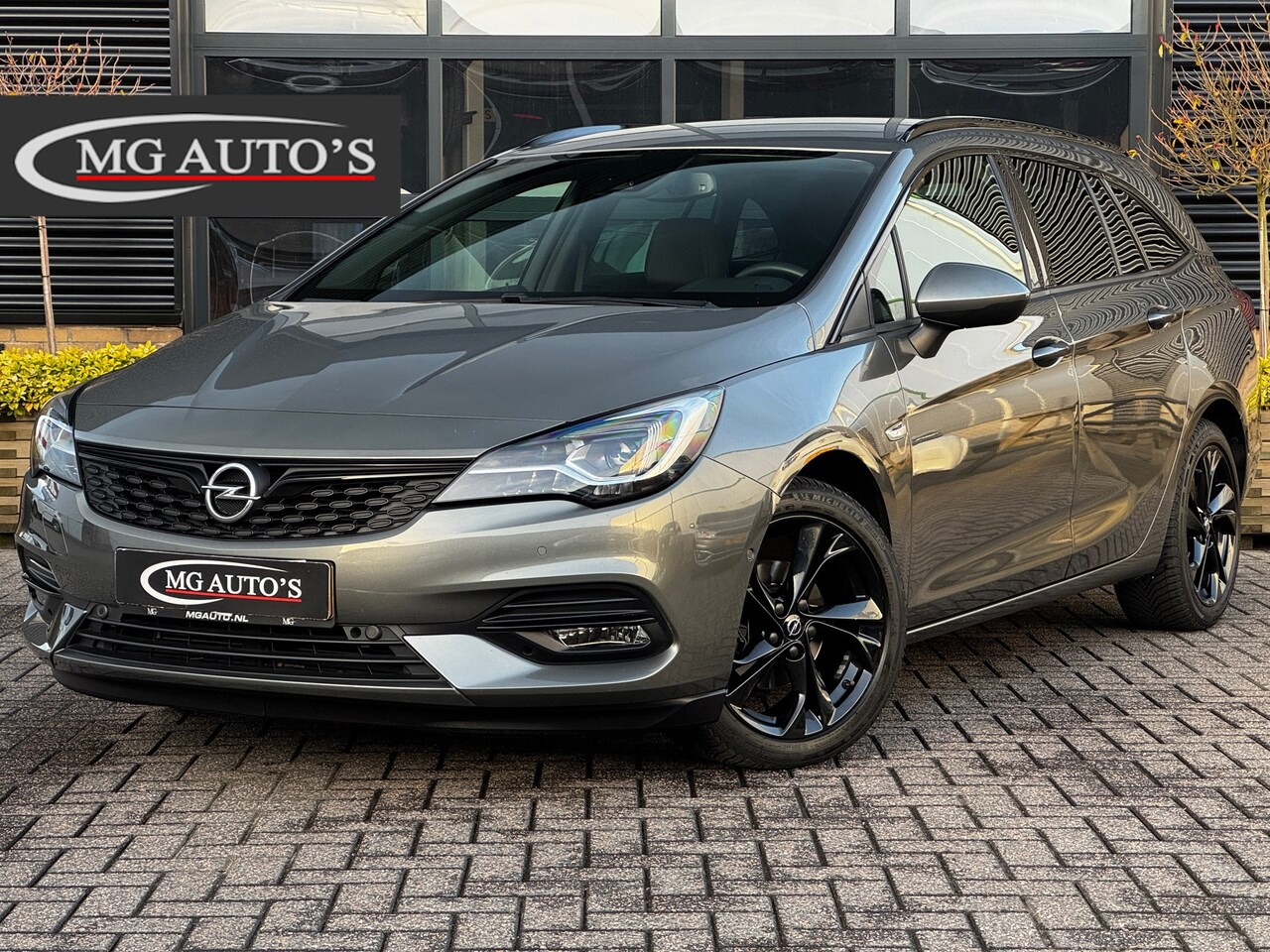 Opel Astra Sports Tourer - 1.4 Ultimate |Trekhaak | Navigatie | Adaptive Cruise Control | Achteruitrijcamera | Parkee - AutoWereld.nl