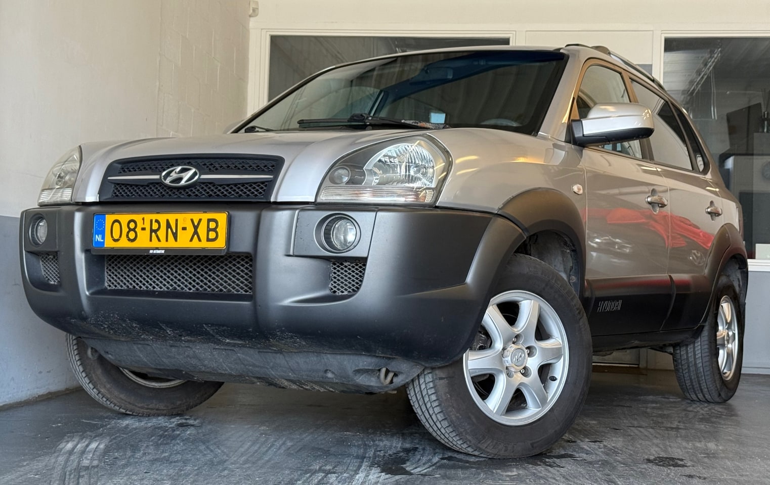 Hyundai Tucson - 2.0i Dynamic|NAP|NweAPK|NweDBriem|Airco|Cruise|Elekramen - AutoWereld.nl