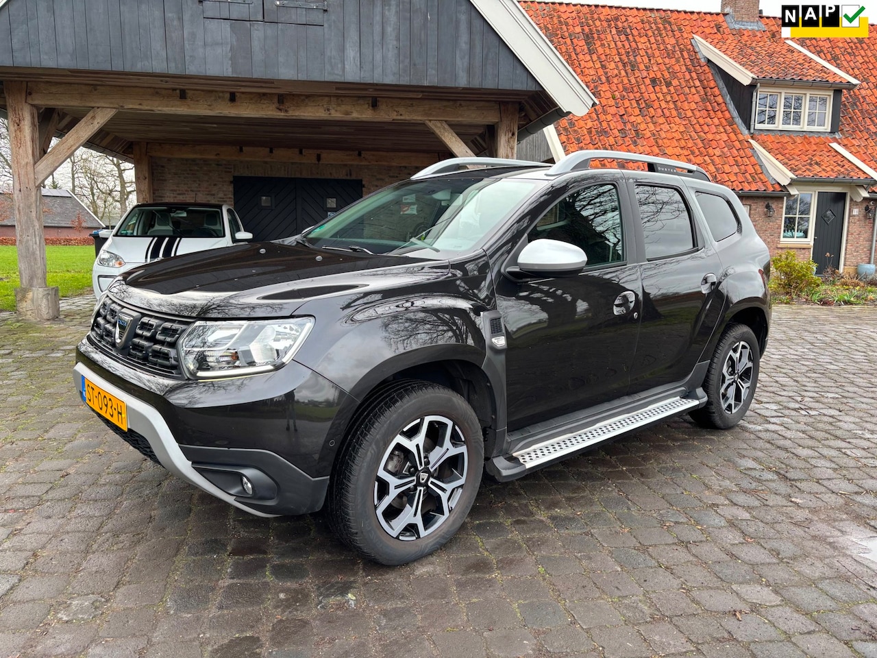 Dacia Duster - 1.2 TCe Prestige met NAP - AutoWereld.nl