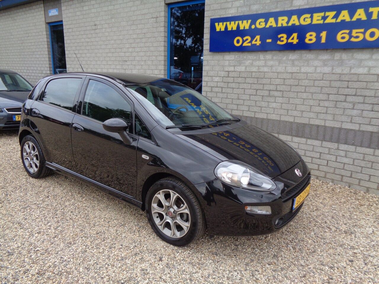 Fiat Punto Evo - 0.9 TwinAir Lounge Airco Lm velgen Cruise control - AutoWereld.nl