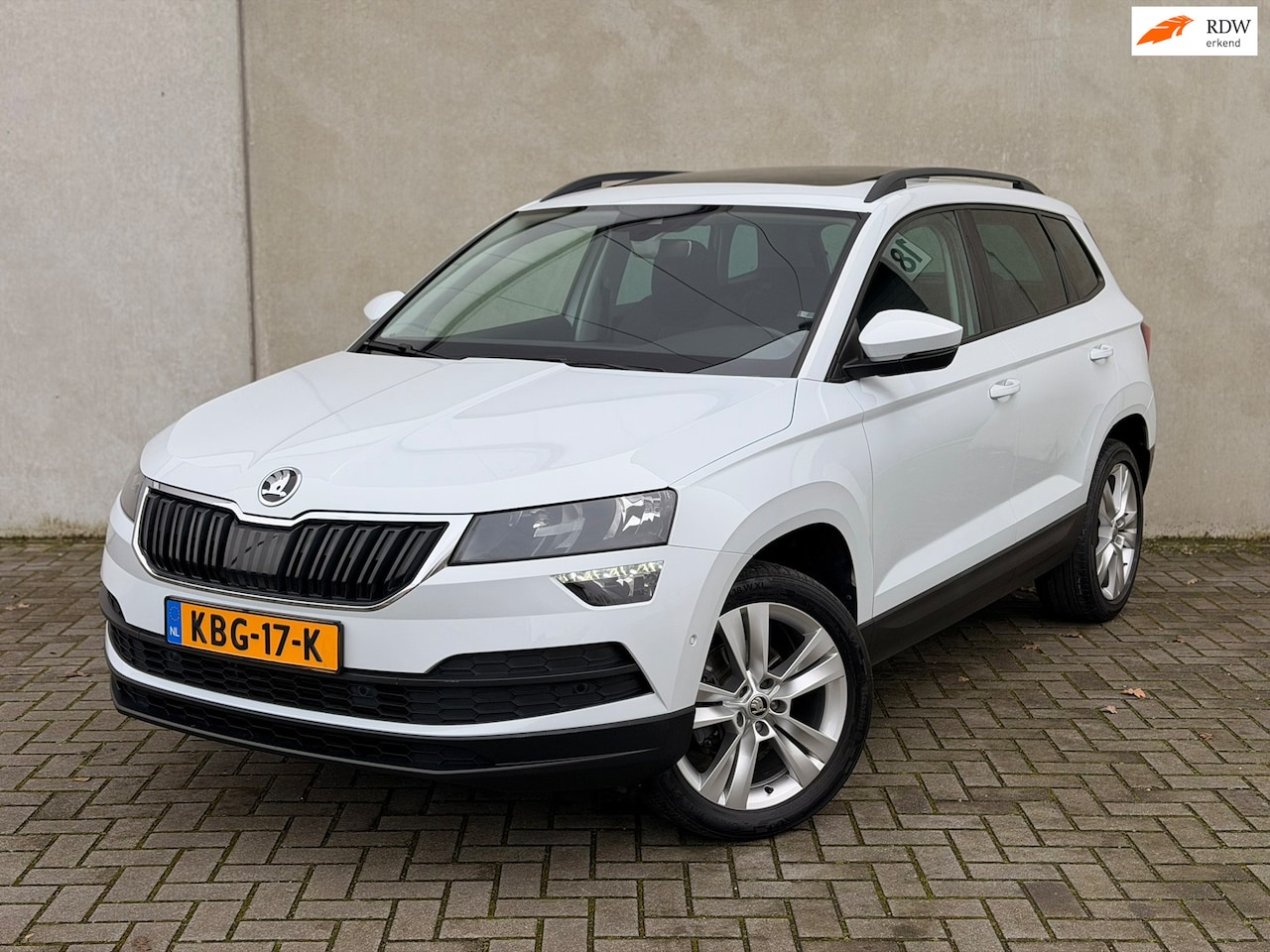 Skoda Karoq - 1.5 TSI ACT DSG Pano Camera CarPlay 18'' Stoelverwarming Elektrische achterklep - AutoWereld.nl