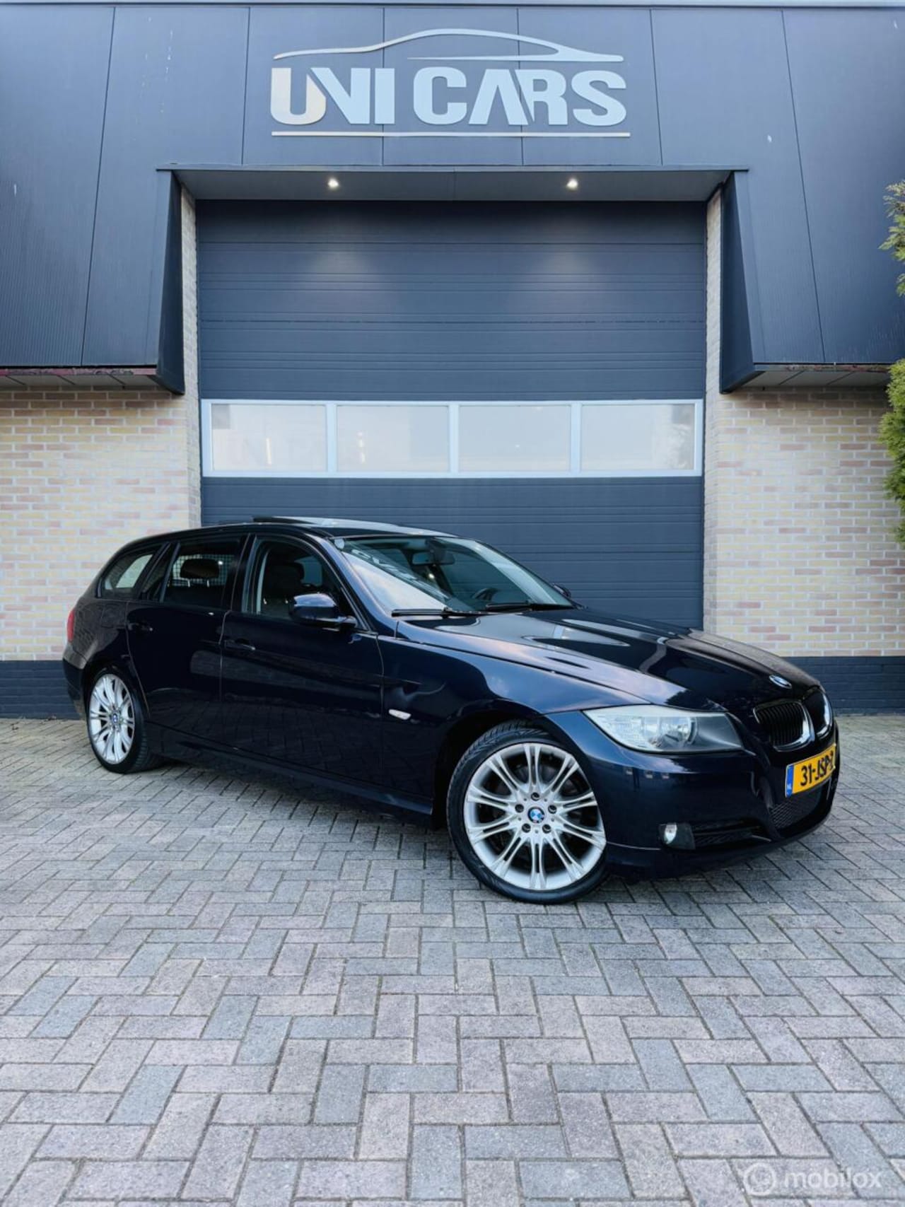 BMW 3-serie Touring - 318i High Executive||Auto|Pano|Navi|LM18 - AutoWereld.nl