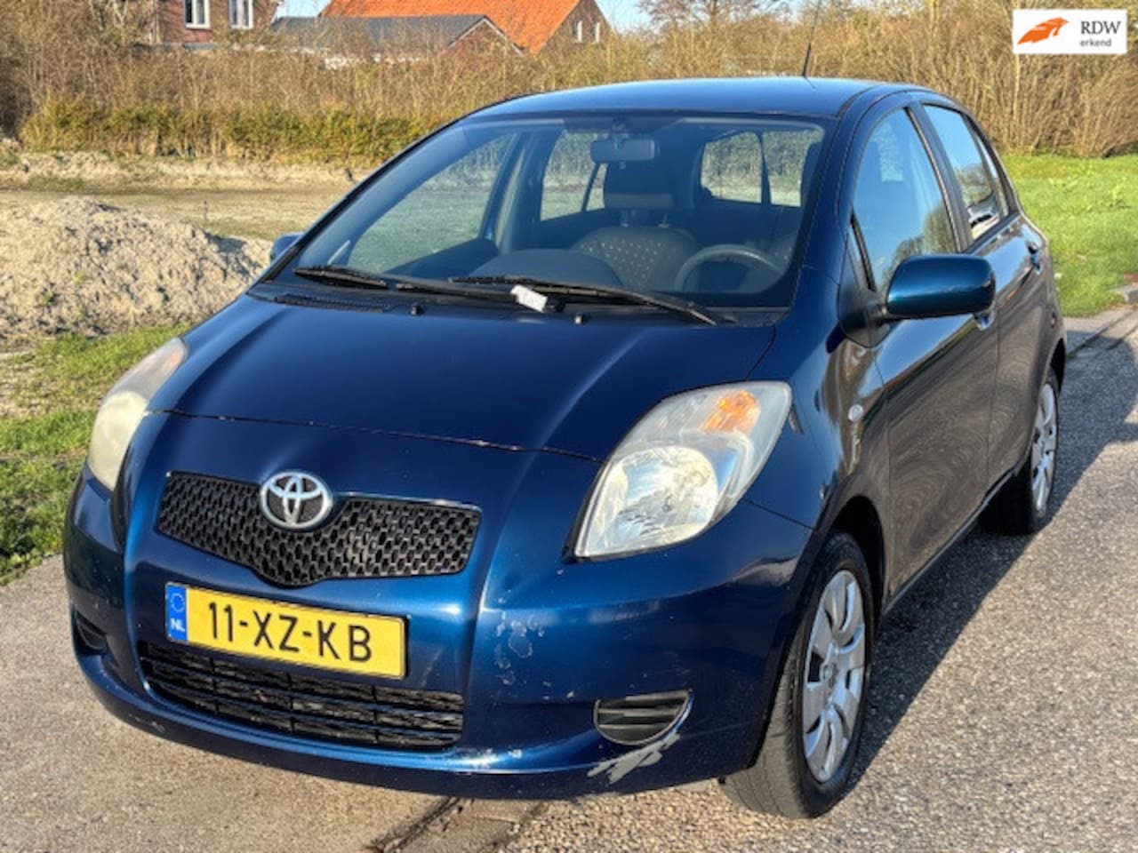 Toyota Yaris - 1.3 VVTi Terra 5-Drs Airco Electric pakket Audio/CD Colorpakket ABS EBD Parkeersensoren De - AutoWereld.nl