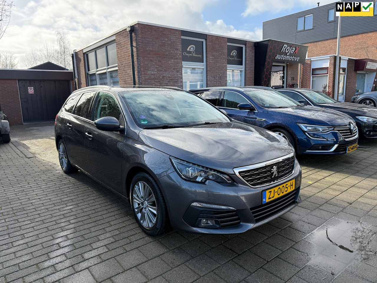 Peugeot 308 SW - 1.2 PureTech Blue Lease Premium PANO - NAVI - AUTOMAAT. - AutoWereld.nl