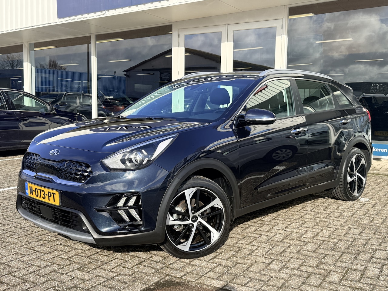 Kia Niro - 1.6 GDi Hybrid DynamicLine | Adapt. Cruise | DAB | Navi | Apple/Android | Schuif-Kanteldak - AutoWereld.nl