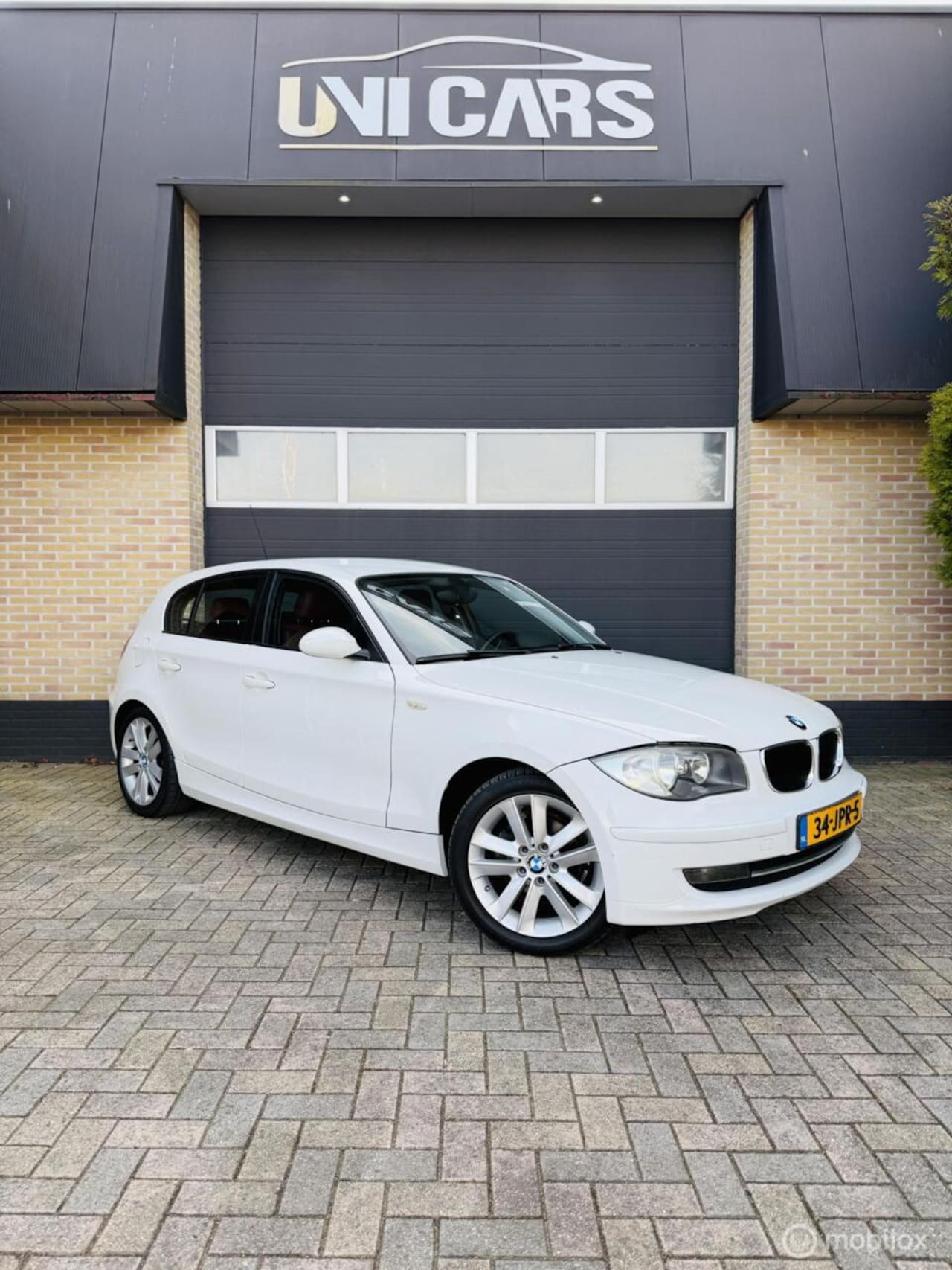 BMW 1-serie - 116i Corporate|Cruis|Airco|leder|New Ketting| - AutoWereld.nl