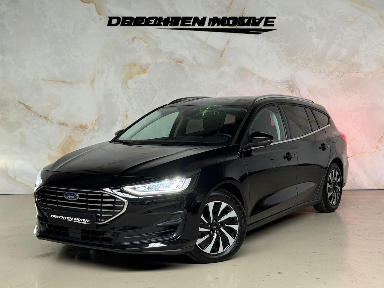 Ford Focus Wagon - 1.0 EcoBoost Hybrid Titanium Automaat / Navi / Cam - AutoWereld.nl