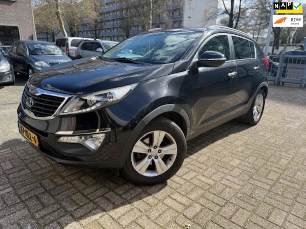 Kia Sportage - 2.0 X-ecutive Plus Pack Navi/Camera/Leer - AutoWereld.nl