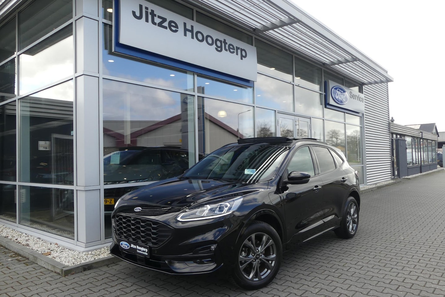 Ford Kuga - 2.5 PHEV ST-Line X PANO, HUD, WINTER PACK, ADAPT. CRUISE, CLIMA, NAVI, CAMERA V&A, PDC V&A - AutoWereld.nl
