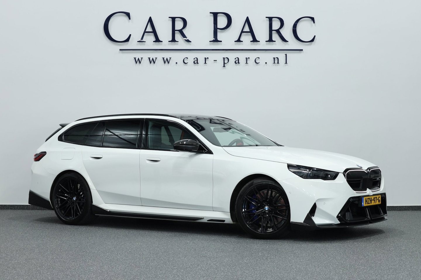 BMW 5-serie Touring - M5 727+PK BTW/AKRAPOVIC/CARBON M-PERFORMANCE/21" LMV/BOWERS & WILKINS/PANO/HUD/ACC/ECC/FAB - AutoWereld.nl