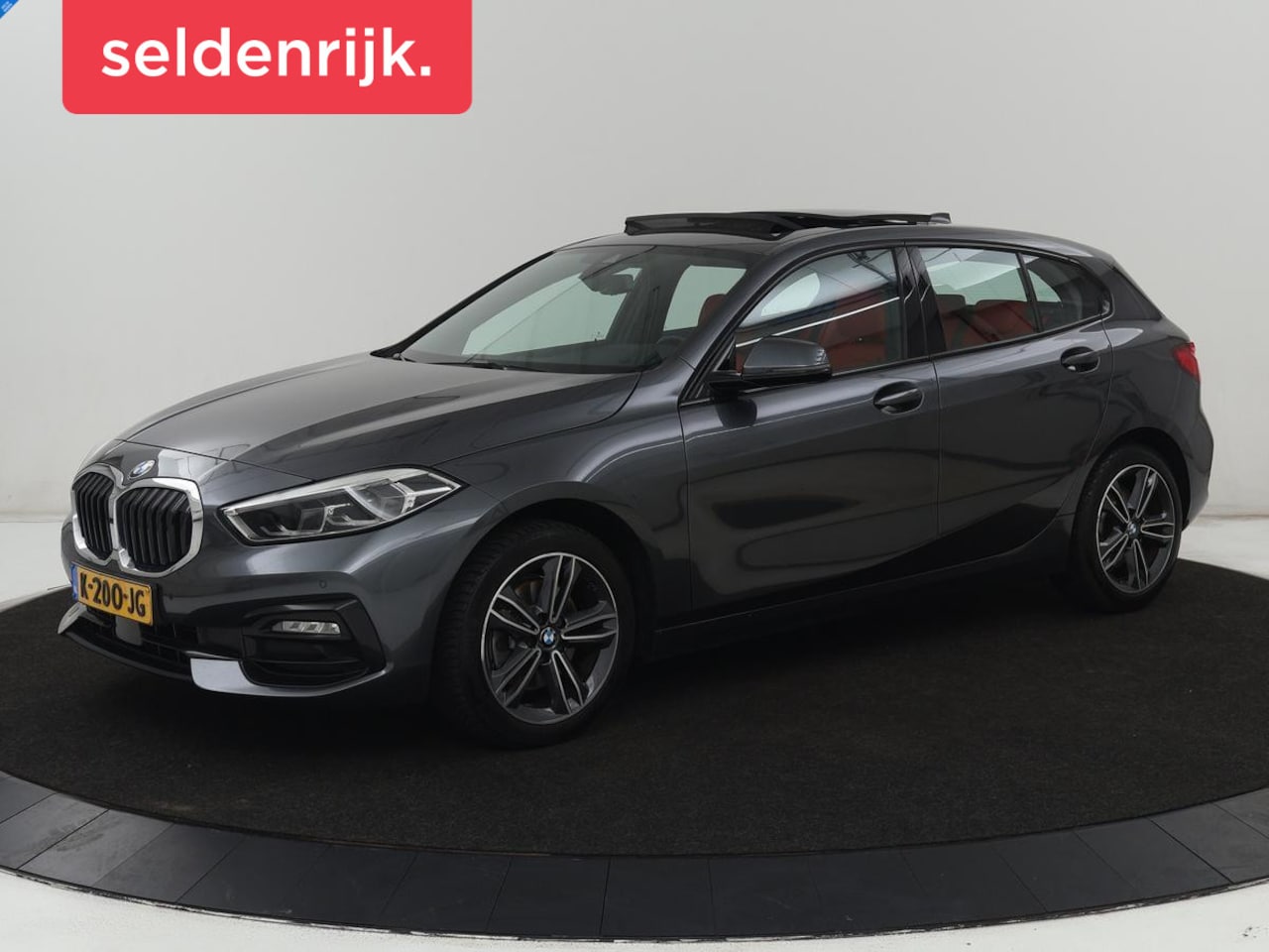 BMW 1-serie - 118i High Executive | Sport Line | Panoramadak | Leder | Stoelverwarming | Keyless | Live - AutoWereld.nl