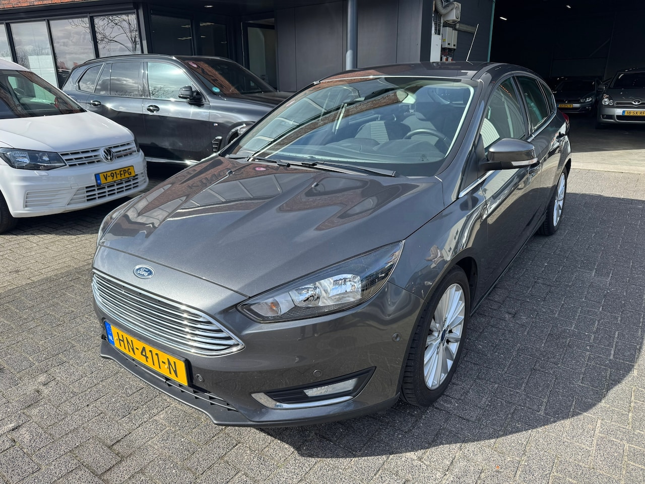 Ford Focus - 1.0 Titanium NAVI CRUISE CLIMA PARKEERSENSOREN ORIG NL NAP - AutoWereld.nl