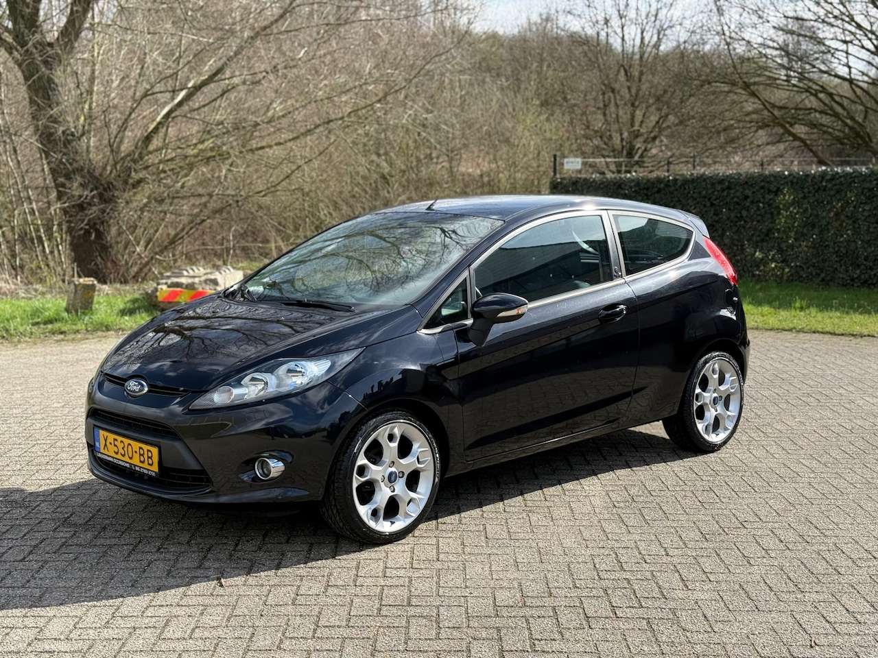 Ford Fiesta - 1.25 Titanium NETTE AUTO I RIEM VV I BLUETOOTH I STOEL VERW - AutoWereld.nl