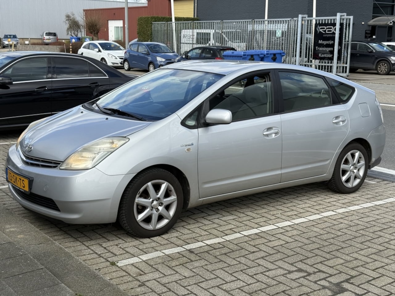 Toyota Prius - 1.5 VVT-i Hybrid 78PK Cruise Dealer Onderhouden - AutoWereld.nl