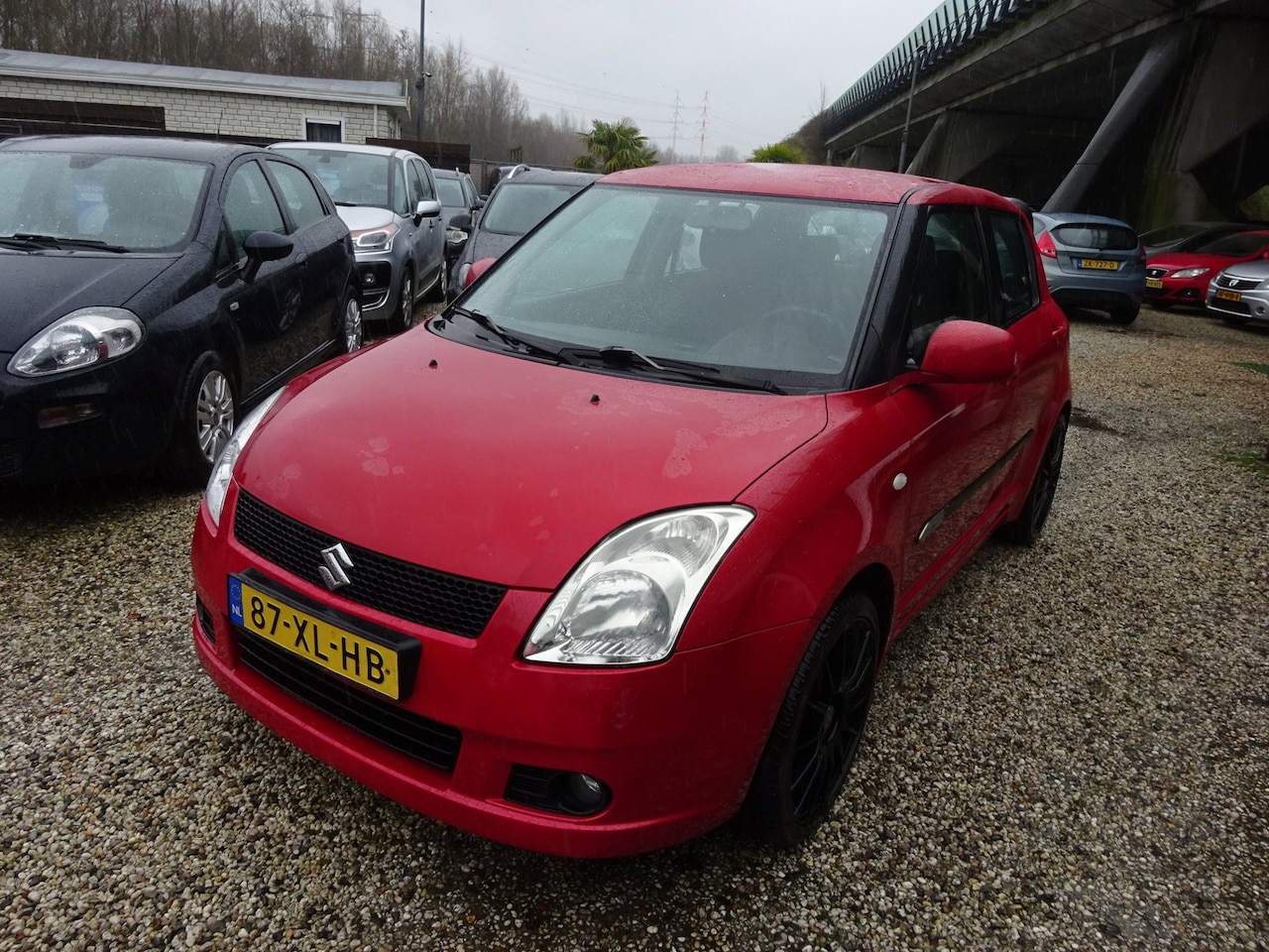 Suzuki Swift - 1.3 Shogun 1.3 Shogun, Airco, Multimedia, Stuurbekrachtiging - AutoWereld.nl