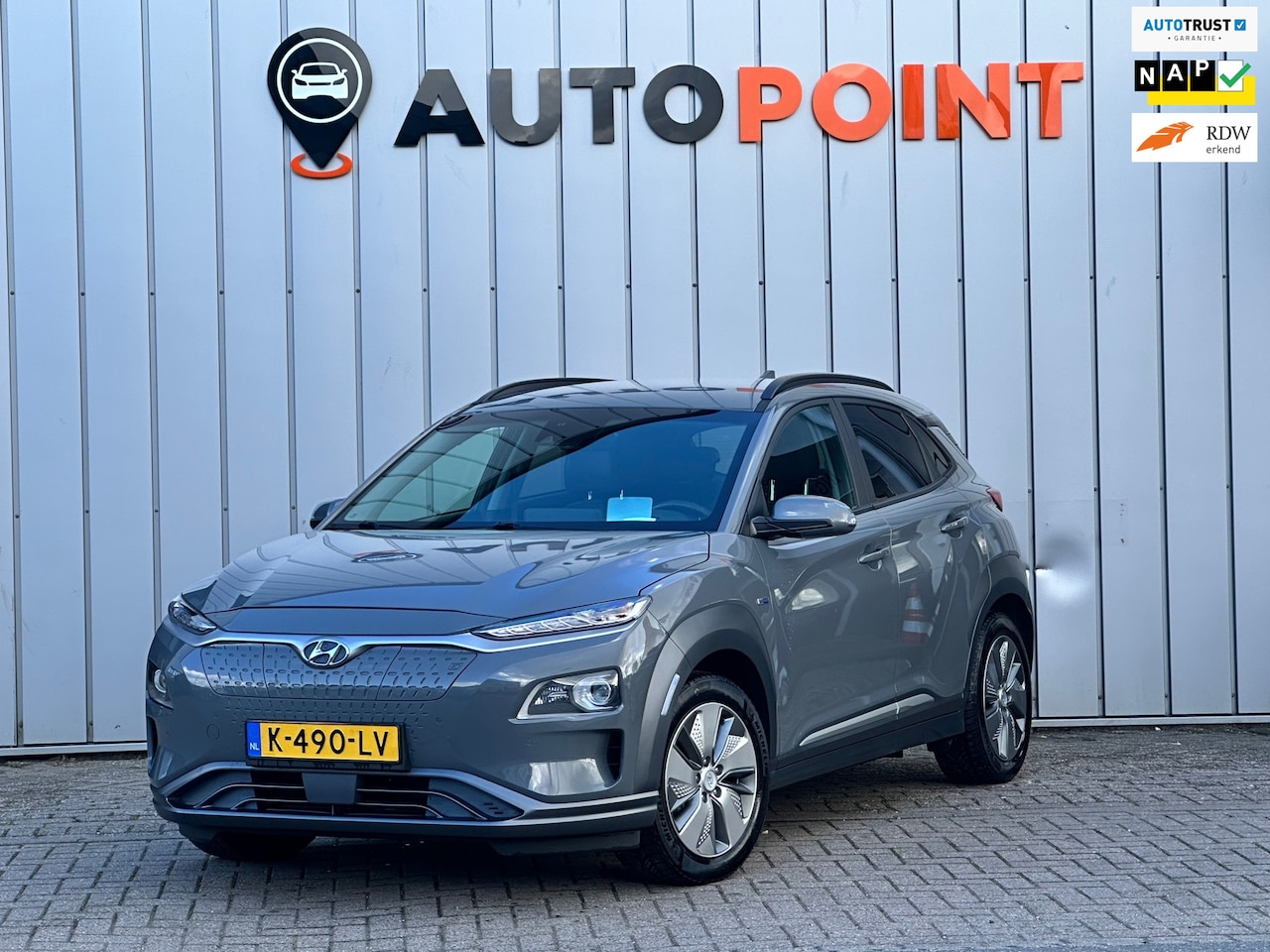 Hyundai Kona Electric - EV Premium 64 kWh SOH 100 % WARMTEPOMP HEAD-UP - AutoWereld.nl