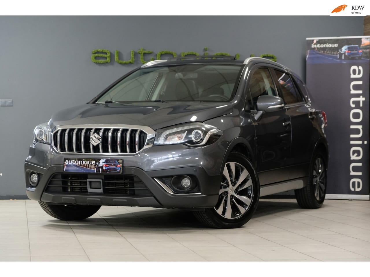 Suzuki S-Cross - 1.4 Boosterjet High Executive *PANORAMADAK* Leder/Automaat/Navi/Camera - AutoWereld.nl