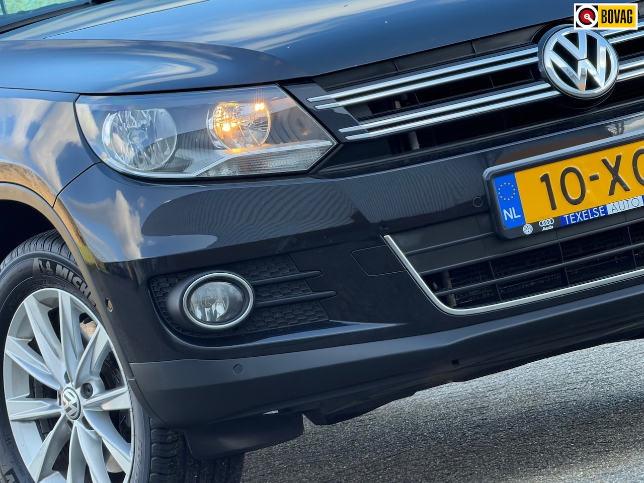 Volkswagen Tiguan - 1.4 TSI Sport&Style - Deep Black Pearl - Carplay/Leder - Superstaat - AutoWereld.nl