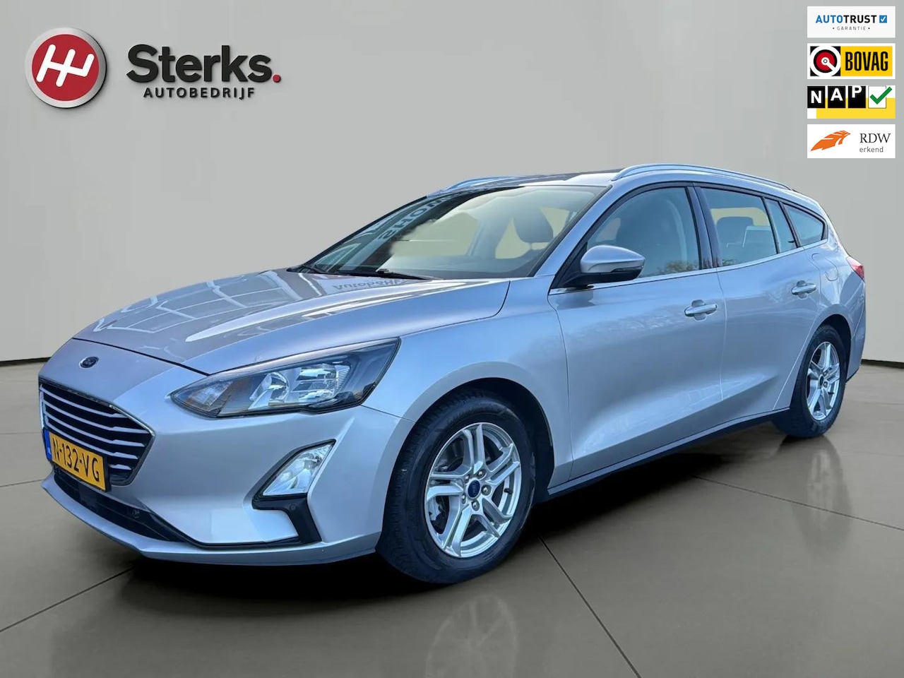 Ford Focus Wagon - 1.0 EcoBoost Hybrid 125 PK Trend Edition Business TREKHAAK CARPLAY/ANDROID AUTO PARKEERSEN - AutoWereld.nl
