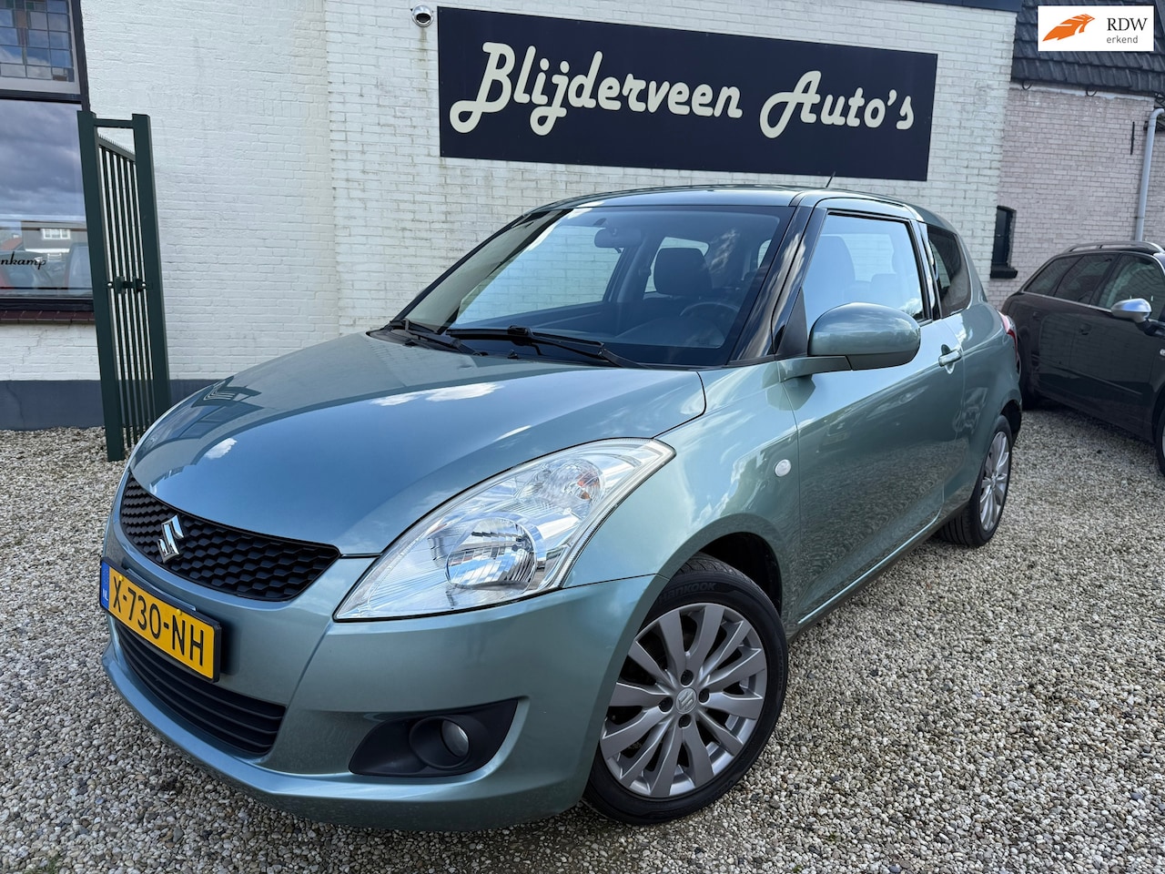 Suzuki Swift - 1.2 Base EASSS Clima | Keyless | LM | Stoelverwarming - AutoWereld.nl