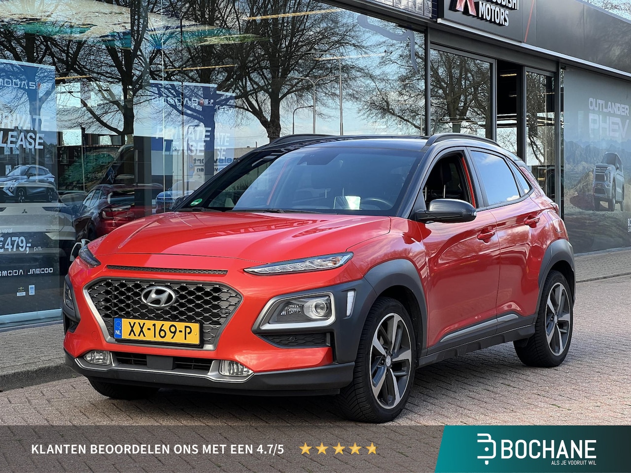 Hyundai Kona - 1.0T Premium 120PK | HUD | Navigatie | Stoel-verwarming en ventilatie | Leder | 1ste eigen - AutoWereld.nl