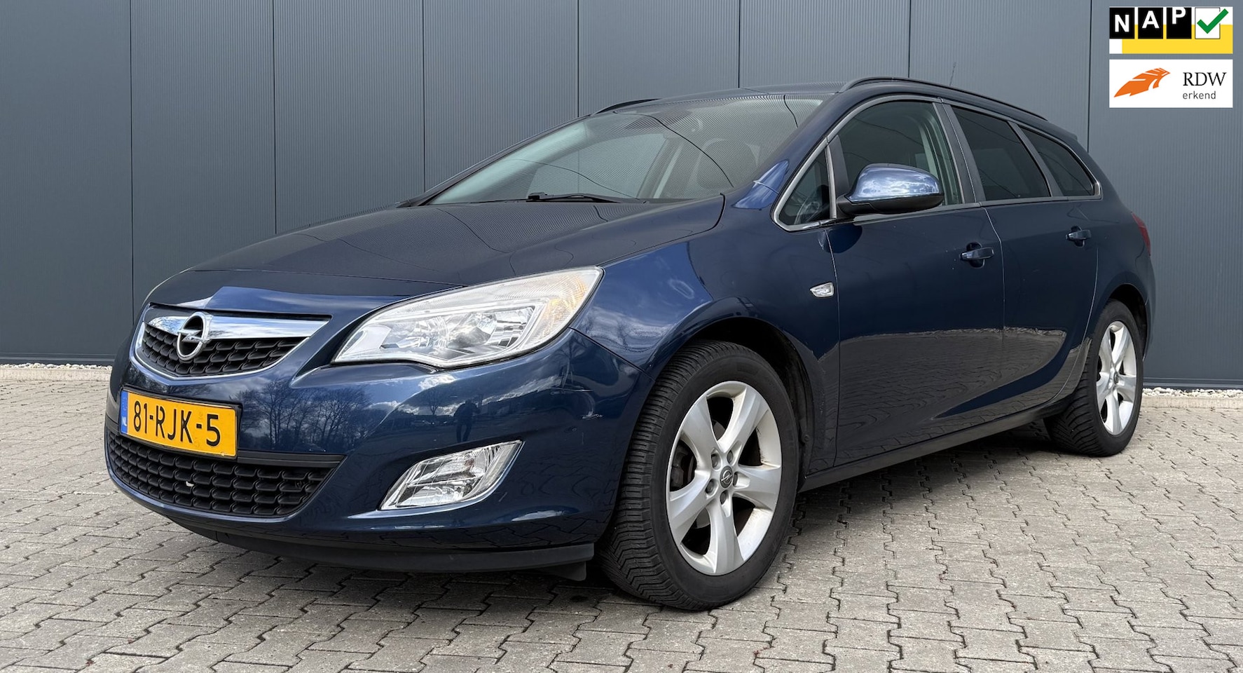 Opel Astra Sports Tourer - 1.4 Turbo Edition Airco cruise Trekhaak APK t/m 2027 - AutoWereld.nl