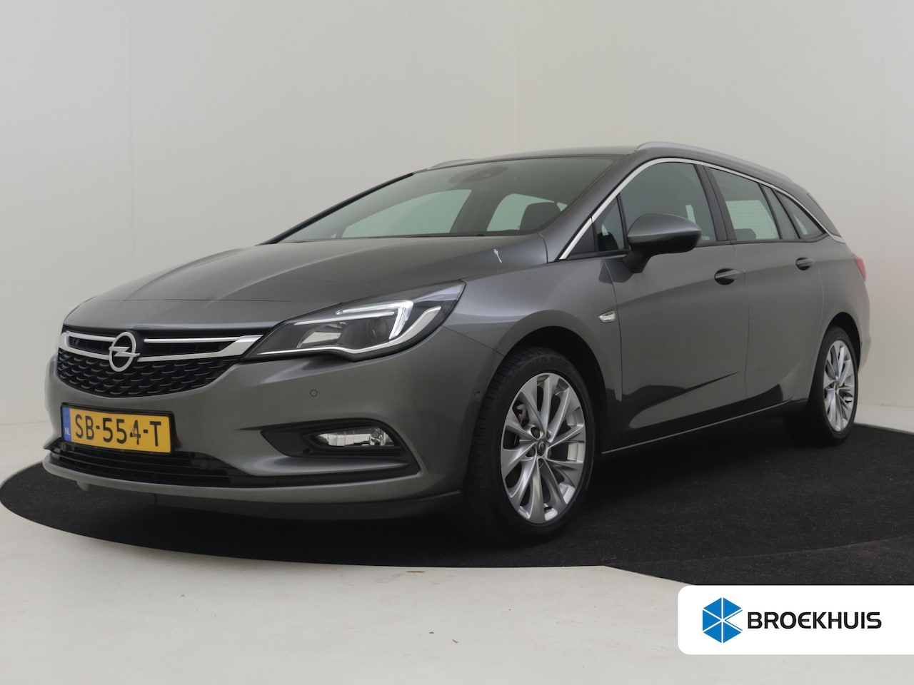 Opel Astra Sports Tourer - 1.4 Business+ 150PK | Trekhaak | Achteruitrijcamera | Cruise control | Navigatie | 17"LMV - AutoWereld.nl