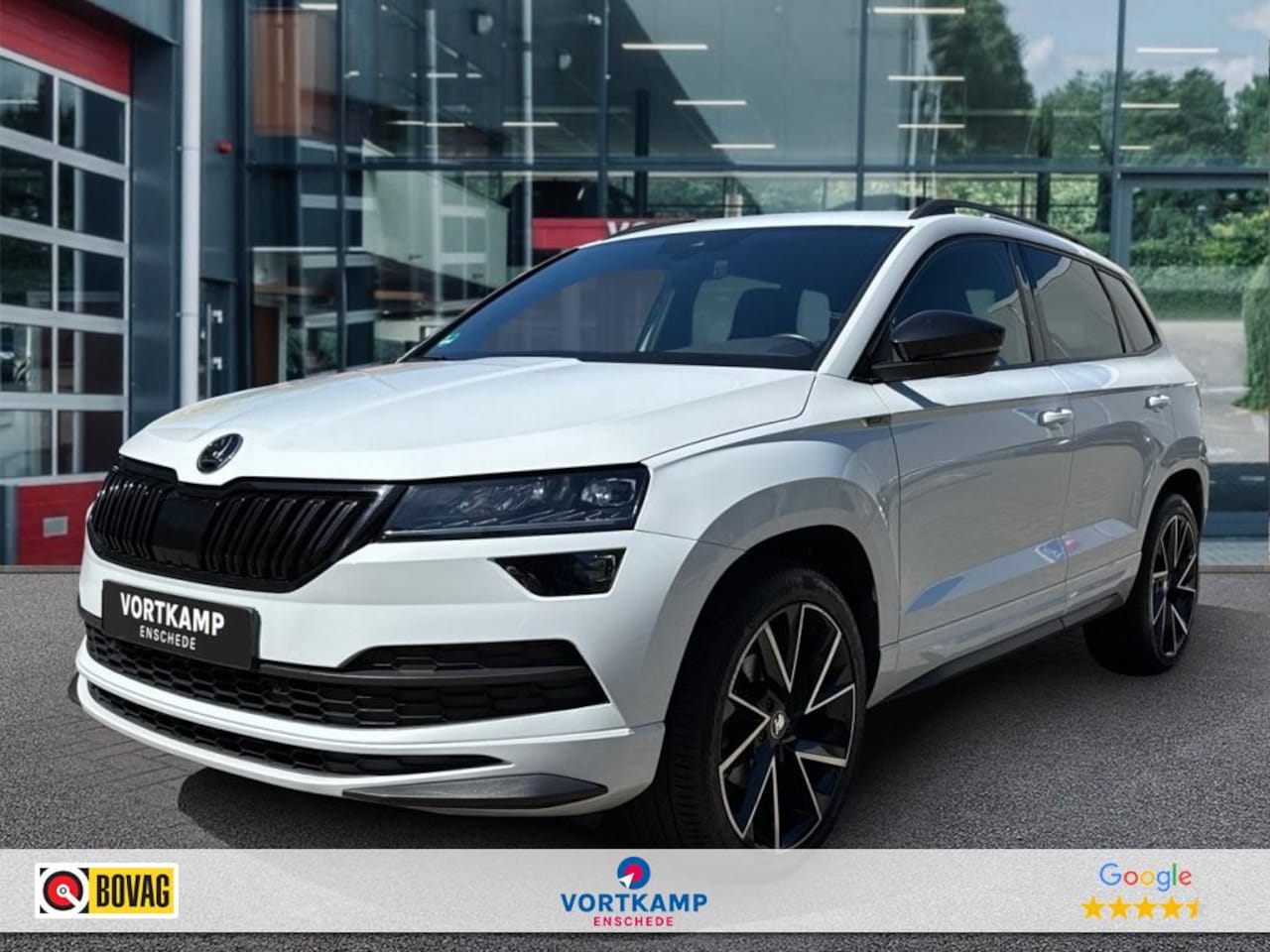 Skoda Karoq - 1.5 TSI DSG SPORTLINE CAMERA/NAVI/ACC/STOELVERW - AutoWereld.nl