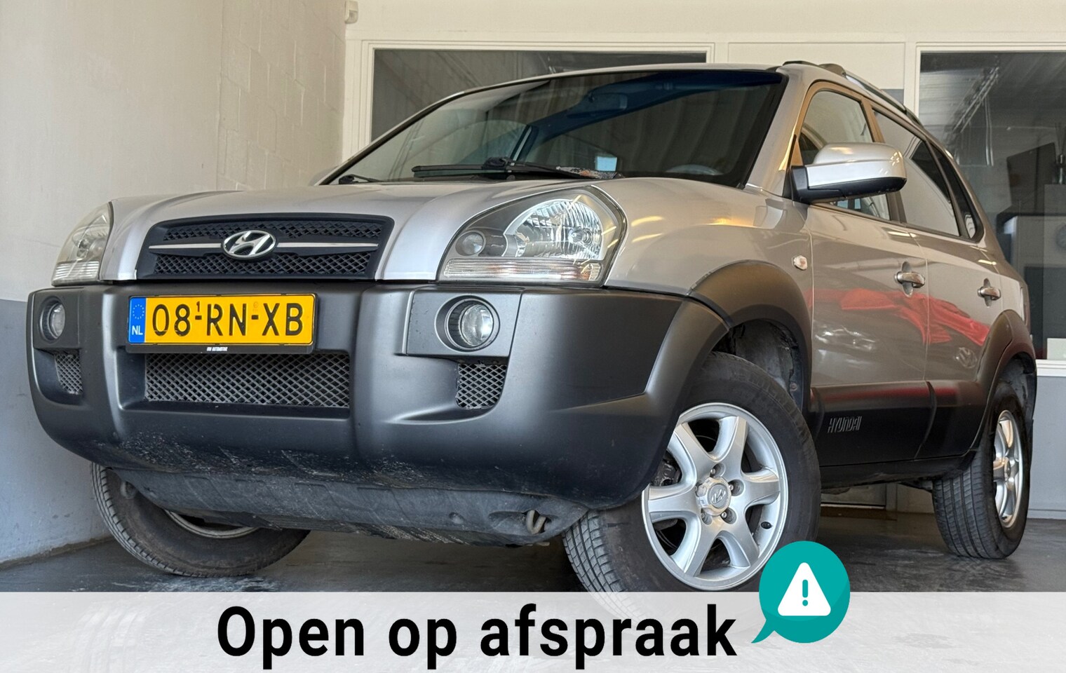 Hyundai Tucson - 2.0i Dynamic|NAP|NweAPK|NweDBriem|Airco|Cruise|Elekramen - AutoWereld.nl