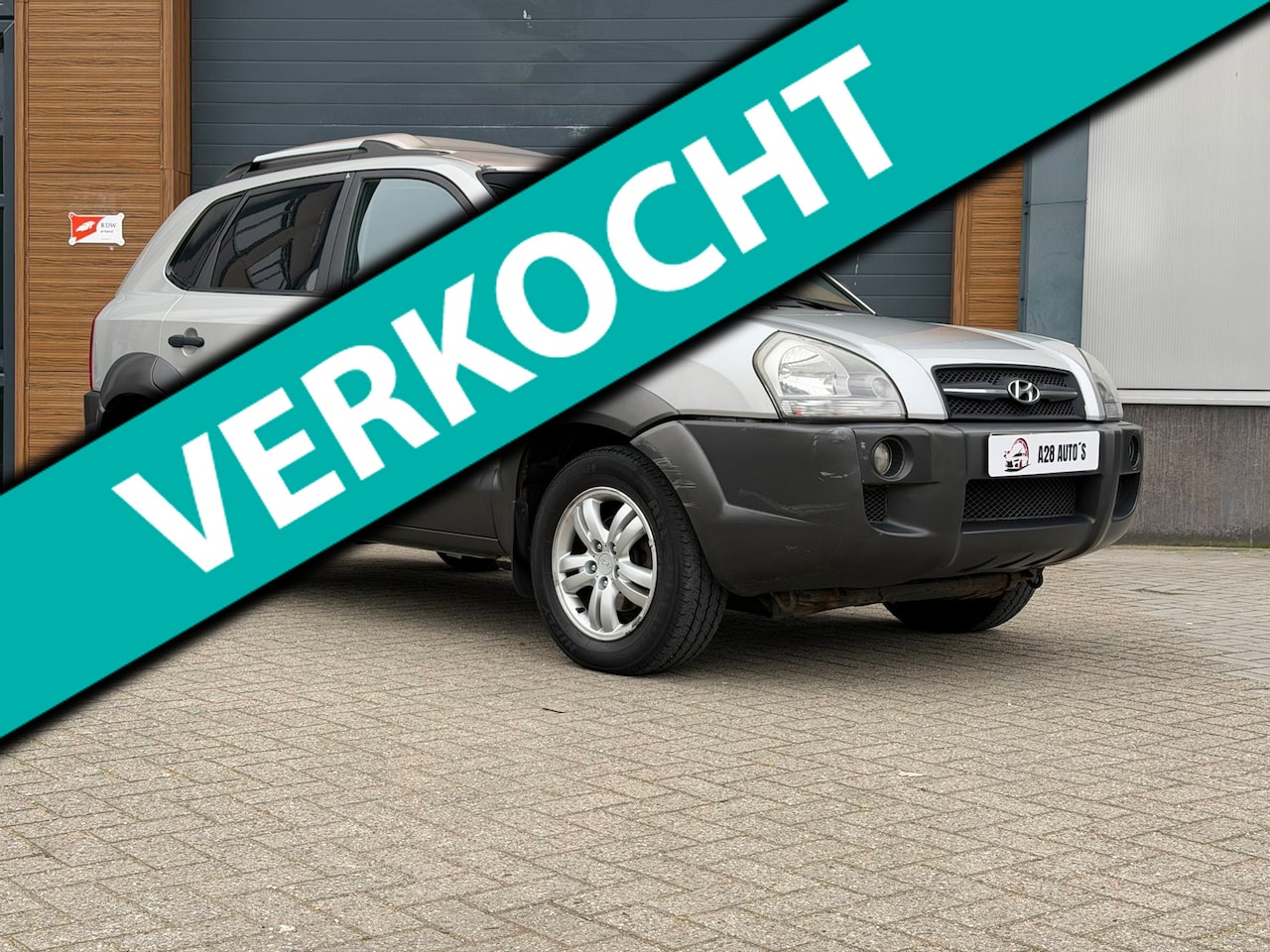 Hyundai Tucson - 2.0 CRDI DynamicVersion 2.0 CRDI DynamicVersion - AutoWereld.nl