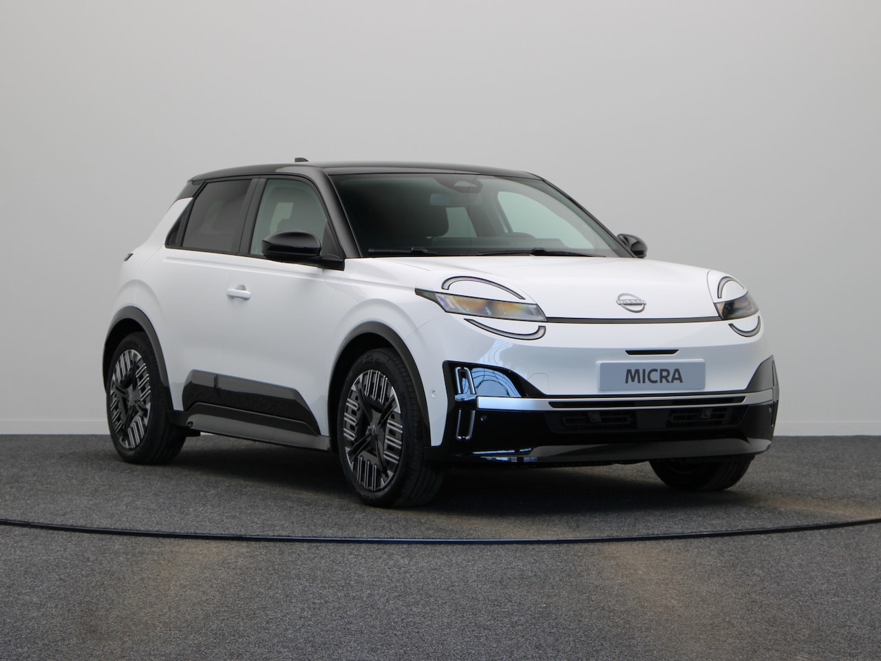Nissan Micra - Advance 52 kWh | Achteruitrijcamera | Draadloze smartphonelader - AutoWereld.nl
