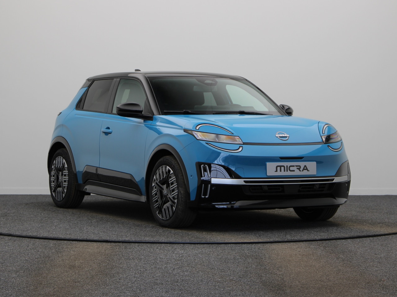 Nissan Micra - Advance 52 kWh | Achteruitrijcamera | Draadloze smartphonelader - AutoWereld.nl