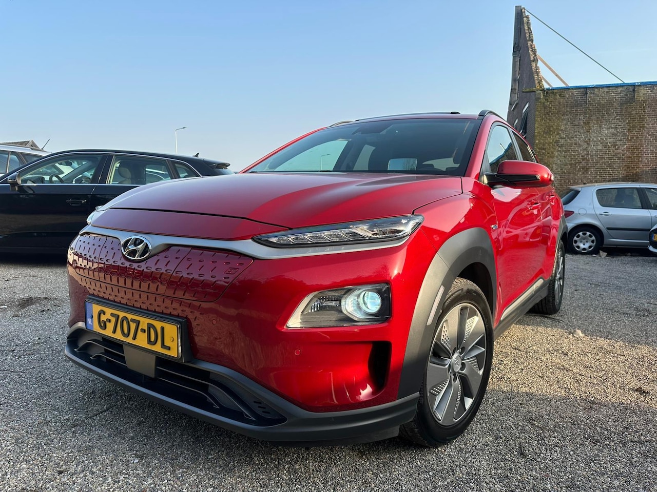 Hyundai Kona Electric - EV Premium 64 kWh 100% SOH 450km Range Vol Optie Uitvoering Leer Dakraam Trekhaak 1e Eig D - AutoWereld.nl