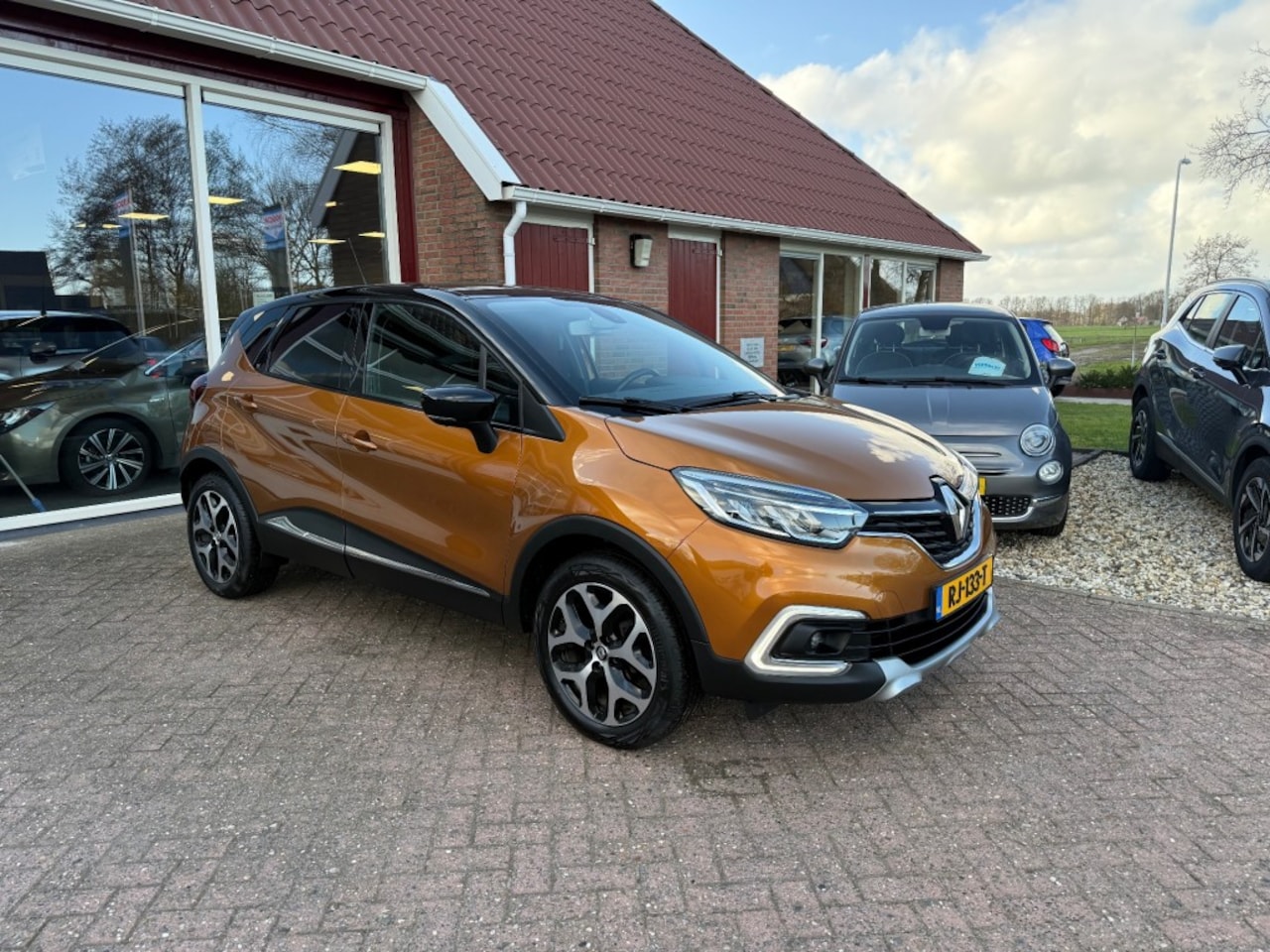 Renault Captur - 0.9 TCE INTENS AIRCO/ECCNAVIGATIEPDCTREKHAAKHOGE ZITen HOGE INSTAP - AutoWereld.nl