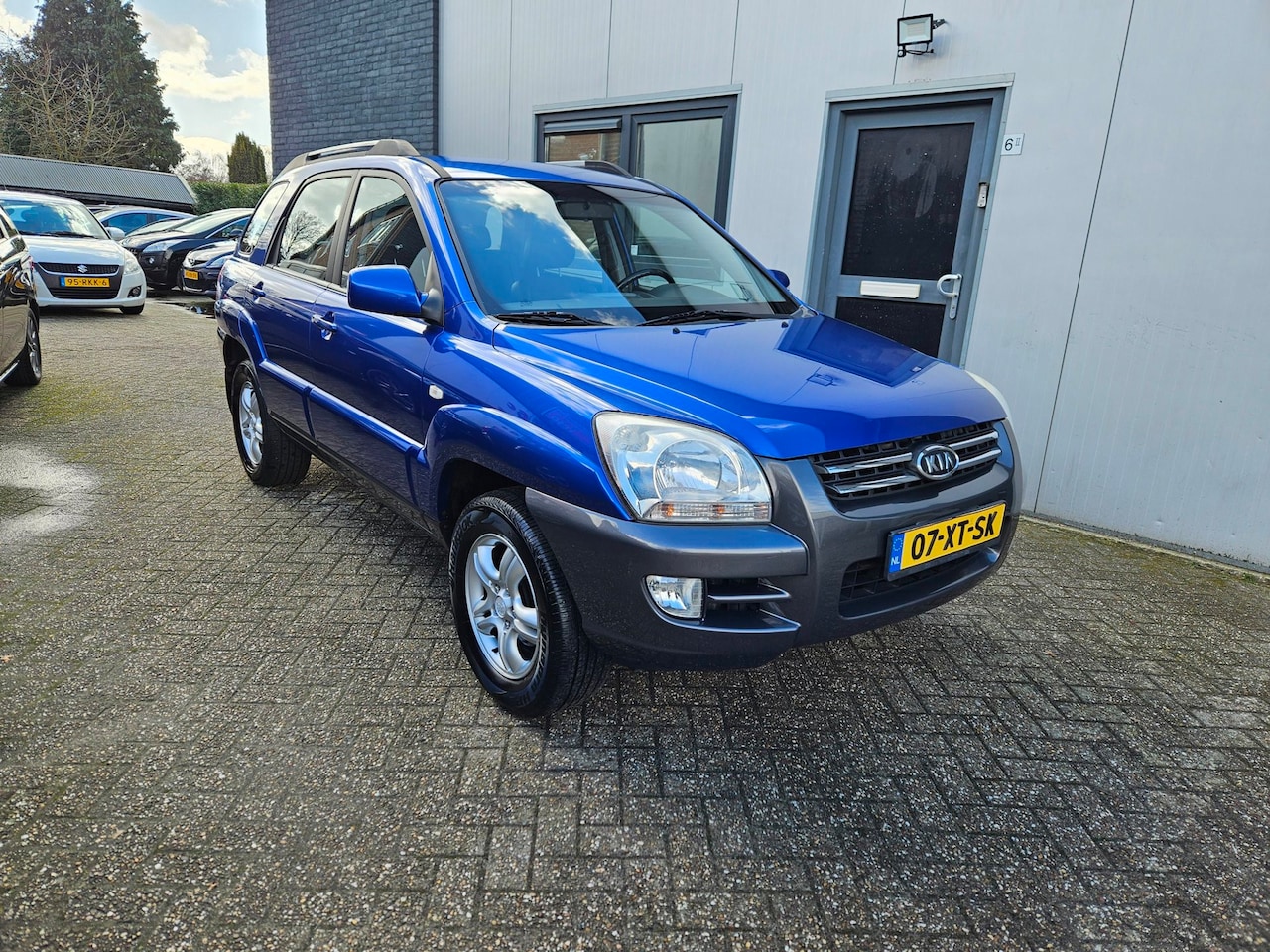 Kia Sportage - 2.0 CVVT Comfort X-pression|Airco|Cruise|Trekhaak - AutoWereld.nl