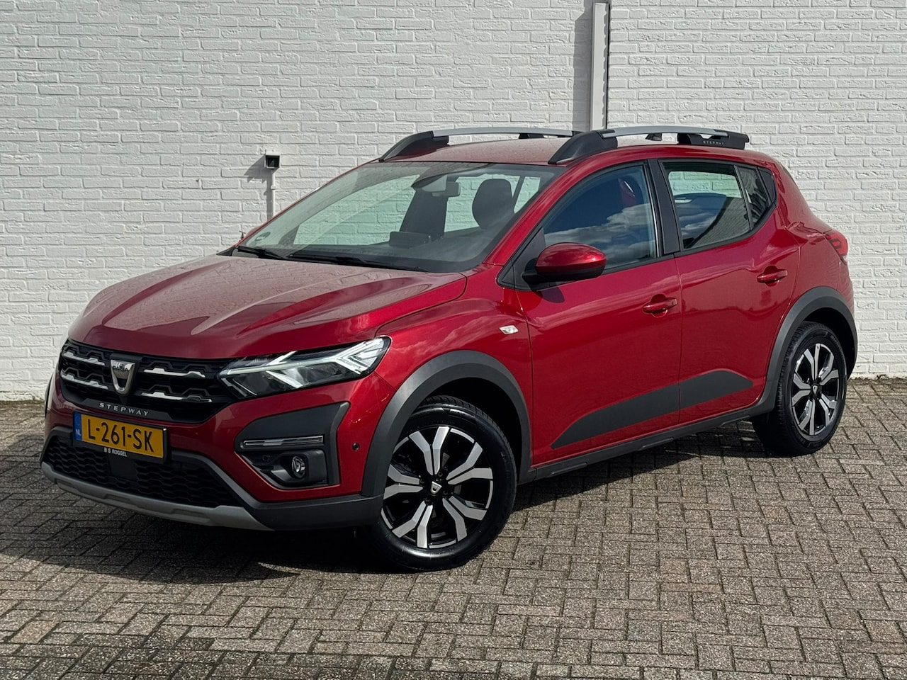 Dacia Sandero Stepway - 1.0 TCe 100 Bi-Fuel Essential Trekhaak Camera Navigatie Clima Cruise - AutoWereld.nl