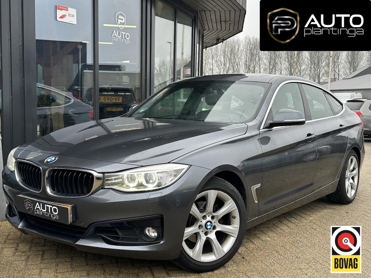 BMW 3-serie Gran Turismo - 320i High Executive | 184 PK | AUTOMAAT | Pano | Lederen Bekleding | Stoelverwarming | Xen - AutoWereld.nl