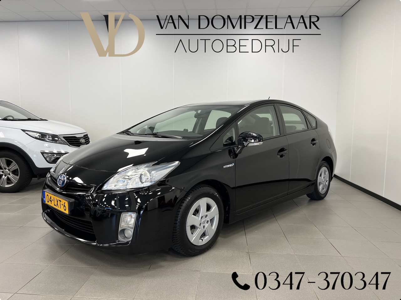 Toyota Prius - 1.8 Comfort / Automaat hybride / Navi / head-up display / - AutoWereld.nl