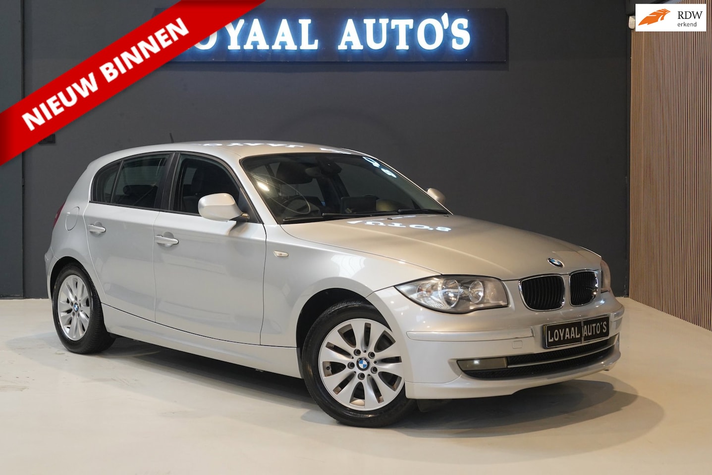 BMW 1-serie - 116i High Executive | AIRCO | CRUISE | PDC | STOELVERW. | ELEK.RAMEN | APK. - AutoWereld.nl