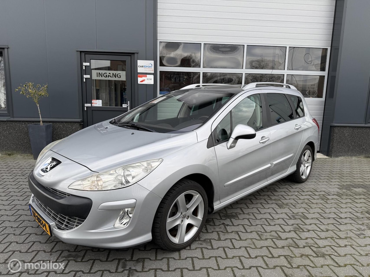Peugeot 308 SW - 1.6 VTi Sublime / Automaat / Pano / Trekhaak - AutoWereld.nl
