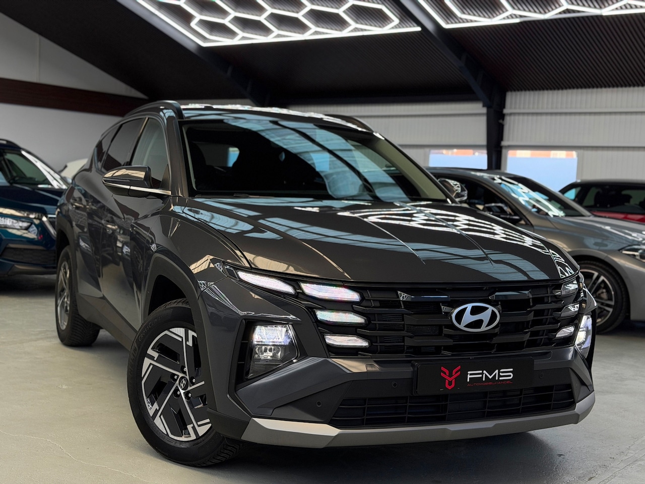Hyundai Tucson - 1.6 T-GDI HEV CarPlay Camera Widescreen - AutoWereld.nl