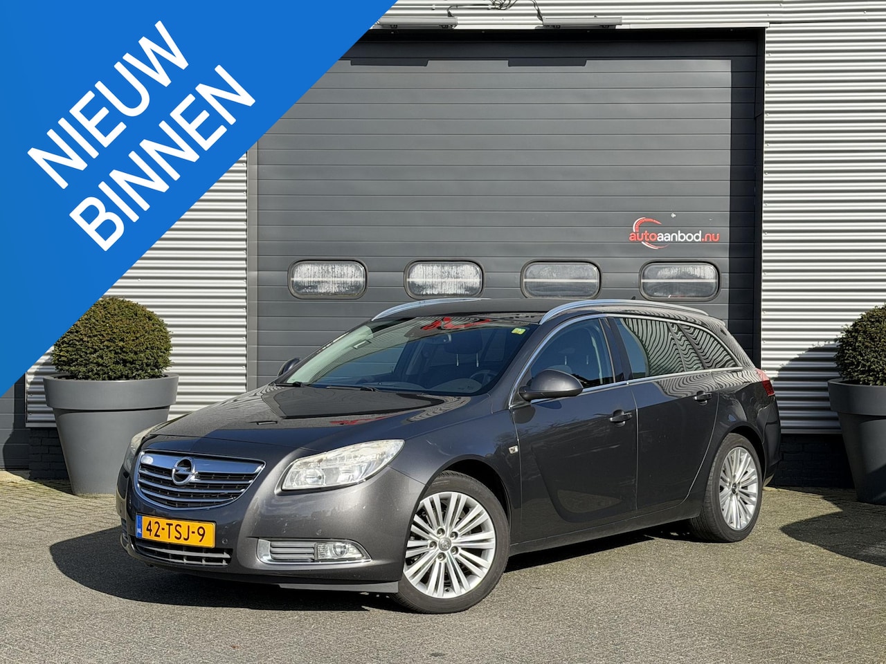 Opel Insignia Sports Tourer - 1.4 Turbo EcoFLEX Business Edition | Navigatie | Parkeersensoren | Lichtmetalen Velgen | - AutoWereld.nl