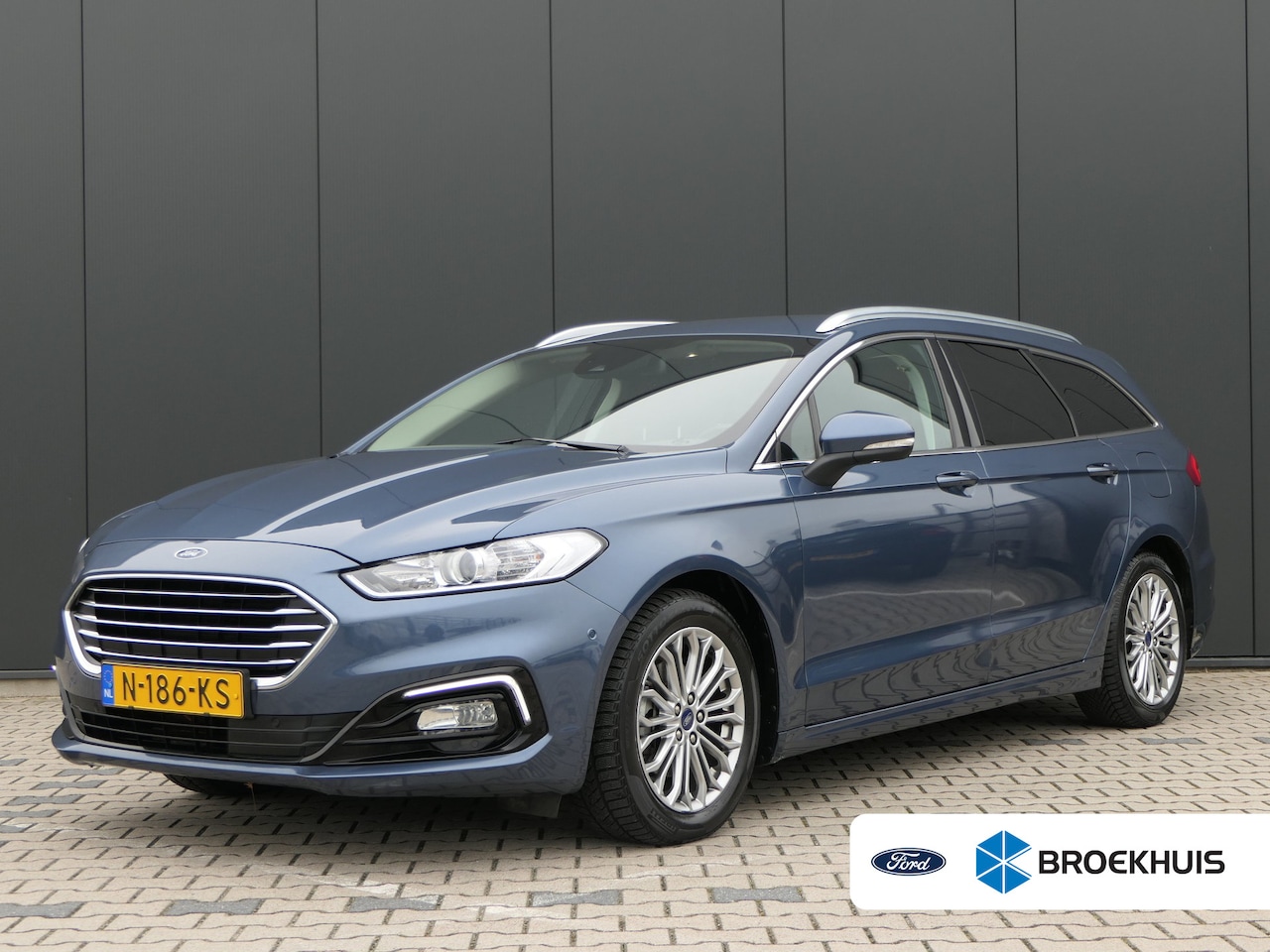 Ford Mondeo Wagon - 2.0 IVCT HEV Titanium | Camera | Privacy Glass | Navigatie | Cruise Control | Stoelverwarm - AutoWereld.nl