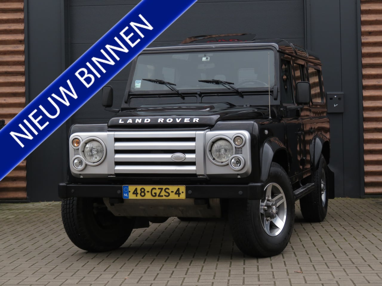 Land Rover Defender 110 - 2.4 TD SW SVX 60th Anniversary Airco Opendak 7-Persoons Orig NL - AutoWereld.nl